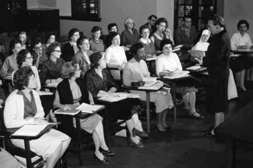 Historical image of female students attending Special Libraries Class in Main Building - GSLIS history