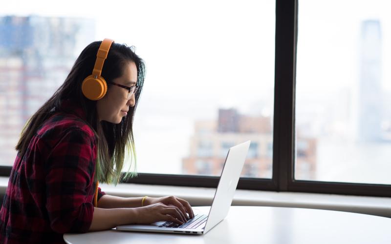 Female student working on laptop