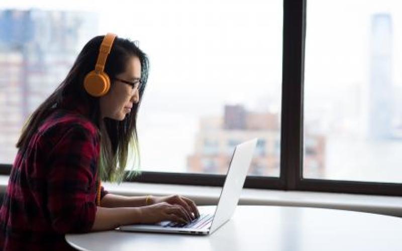 female-student-working-on-laptop